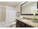 Clean bathroom with granite countertop, shower/tub combo at 8205 Roseville, Davenport, FL 33896