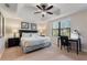 Spacious bedroom with king-size bed, desk and chair, and large window at 8205 Roseville, Davenport, FL 33896