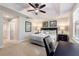 King-size bedroom with a large window, a desk, and plenty of space at 8205 Roseville, Davenport, FL 33896