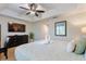 Main bedroom with king bed and large TV, creating a relaxing atmosphere at 8205 Roseville, Davenport, FL 33896
