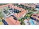 Complex of apartment buildings with pool and parking area at 904 Charo Pkwy # 517, Davenport, FL 33897