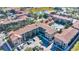 Aerial view of apartment buildings, pool, and pond at 904 Charo Pkwy # 517, Davenport, FL 33897