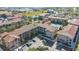 Aerial view of community with resort-style pool and ample parking at 904 Charo Pkwy # 517, Davenport, FL 33897