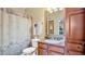Updated bathroom with granite vanity, shower/tub combo, and linen closet at 904 Charo Pkwy # 517, Davenport, FL 33897