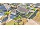 Aerial view of a single-Gathering house with a landscaped yard and driveway at 7525 Jessamine Dr, Lakeland, FL 33810