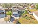 Aerial view of a single-Gathering house with a driveway and landscaping at 7525 Jessamine Dr, Lakeland, FL 33810