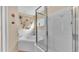 Bathroom with glass shower enclosure and corner bathtub at 7525 Jessamine Dr, Lakeland, FL 33810