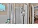 Clean bathroom with shower/tub combo and glass enclosure at 7525 Jessamine Dr, Lakeland, FL 33810