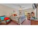 Bright bedroom with a comfy bed and access to the backyard at 7525 Jessamine Dr, Lakeland, FL 33810