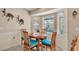 Cozy breakfast nook with a round table and four chairs at 7525 Jessamine Dr, Lakeland, FL 33810