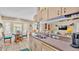 Bright kitchen with ample counter space, stainless steel sink, and breakfast nook at 7525 Jessamine Dr, Lakeland, FL 33810