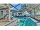 Relaxing screened pool and patio furniture at 7525 Jessamine Dr, Lakeland, FL 33810