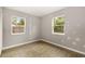 Bedroom with tile flooring and two windows, some paint repair needed at 2473 Barbarossa, Deltona, FL 32738