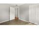 Bedroom with tile floor, door to hallway, and built-in closet at 2473 Barbarossa, Deltona, FL 32738