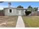 Exterior of a single story house with a walkway and lawn at 2473 Barbarossa, Deltona, FL 32738