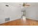 Bright living room with hardwood floors and a ceiling fan at 2473 Barbarossa, Deltona, FL 32738