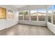 Bright sunroom with lots of windows, vinyl flooring, and exterior access at 2473 Barbarossa, Deltona, FL 32738