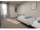 Guest bedroom with twin bed and closet at 305 Wharf Way, Winter Haven, FL 33881