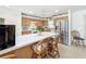 Kitchen features a large island with seating and stainless steel appliances at 309 W Frederick Ave, Dundee, FL 33838