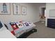 bedroom with nautical-themed decor and built-in window seat at 313 Wharf Way, Winter Haven, FL 33881