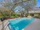 Inviting screened-in pool with plenty of lounging space at 3845 Garnet Dr, Mulberry, FL 33860