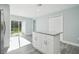 Modern kitchen with white cabinets and a large island at 726 Tennessee Rd, Lakeland, FL 33815