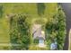 Aerial view showcasing the house and expansive property at 1730 Broken Arrow N Trl, Lakeland, FL 33813
