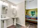 Main bathroom with double vanity and view of bedroom at 1730 Broken Arrow N Trl, Lakeland, FL 33813
