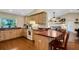 L-shaped kitchen with ample counter space and wooden cabinetry at 1730 Broken Arrow N Trl, Lakeland, FL 33813
