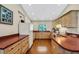 Open concept kitchen with light wood cabinets and a center island at 1730 Broken Arrow N Trl, Lakeland, FL 33813