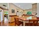 Kitchen with light wood cabinets, a breakfast bar, and recessed lighting at 1730 Broken Arrow N Trl, Lakeland, FL 33813