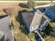 Aerial view of house, yard, and neighborhood at 1918 Wind Meadows Dr, Bartow, FL 33830