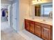 Double vanity bathroom with walk-in closet at 1918 Wind Meadows Dr, Bartow, FL 33830