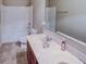 Bathroom with double vanity, shower, and bathtub at 1918 Wind Meadows Dr, Bartow, FL 33830