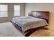 Main bedroom with large bed and window at 1918 Wind Meadows Dr, Bartow, FL 33830