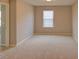 Spacious bedroom with neutral walls and carpet at 1918 Wind Meadows Dr, Bartow, FL 33830