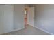 Bedroom with double doors and carpet flooring at 1918 Wind Meadows Dr, Bartow, FL 33830