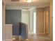 Upstairs hallway with neutral paint and carpet at 1918 Wind Meadows Dr, Bartow, FL 33830