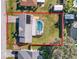 Aerial view showing single-story house, pool, and large backyard at 227 Ridgedale Dr, Lakeland, FL 33809