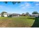 Large backyard with screened pool and patio area at 227 Ridgedale Dr, Lakeland, FL 33809