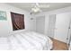 Well-lit bedroom with double bed and built-in closet at 227 Ridgedale Dr, Lakeland, FL 33809