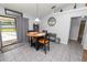 Small dining area with round table and chairs near kitchen at 227 Ridgedale Dr, Lakeland, FL 33809