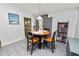 Cozy dining area with round table and chairs, view of backyard at 227 Ridgedale Dr, Lakeland, FL 33809