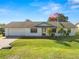 Single-story home with attached garage and landscaped lawn at 227 Ridgedale Dr, Lakeland, FL 33809