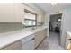 Kitchen with stainless steel appliances and view of dining area at 227 Ridgedale Dr, Lakeland, FL 33809