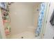 Large walk-in shower with tiled walls and seat at 227 Ridgedale Dr, Lakeland, FL 33809