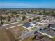 Aerial view of house and neighborhood; property is marked at 2728 Sunrise Landing Ln, Lakeland, FL 33812