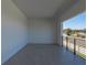 Spacious balcony with tiled floor and distant neighborhood view at 2728 Sunrise Landing Ln, Lakeland, FL 33812