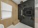 Luxurious bathroom with marble shower, soaking tub, and double vanity at 2728 Sunrise Landing Ln, Lakeland, FL 33812