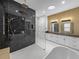Spa-like bathroom featuring a walk-in shower, freestanding tub, and modern vanity at 2728 Sunrise Landing Ln, Lakeland, FL 33812